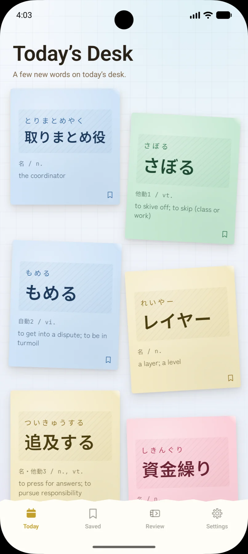 今日の机。付箋になった新出単語が並んでいる。